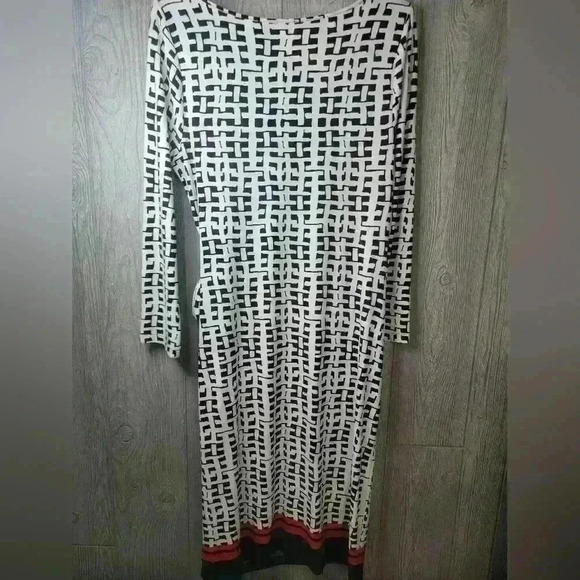 Ann Klein black and white design dress with orange strip stripe on bottom. - Picture 5 of 6